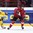 HELSINKI, FINLAND - DECEMBER 26: Switzerland's Jonas Siegenthaler #25 looks for a pass with pressure from Sweden's Rasmus Asplund #18 during preliminary round action at the 2016 IIHF World Junior Championship. (Photo by Matt Zambonin/HHOF-IIHF Images)

